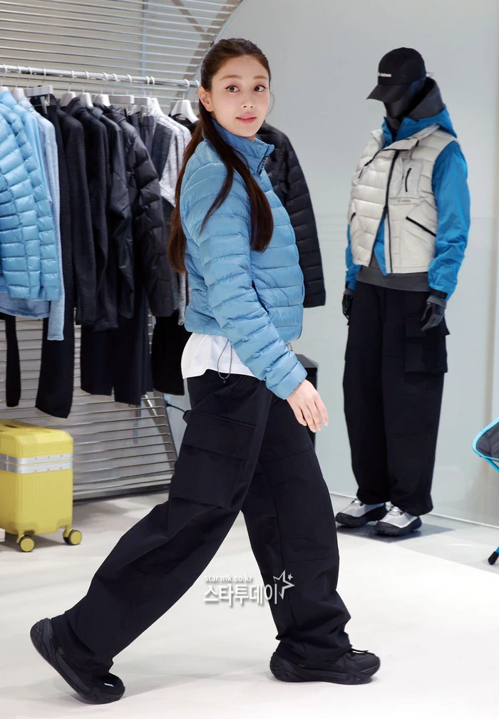 Jihyo wearing Helinox outdoor apparel